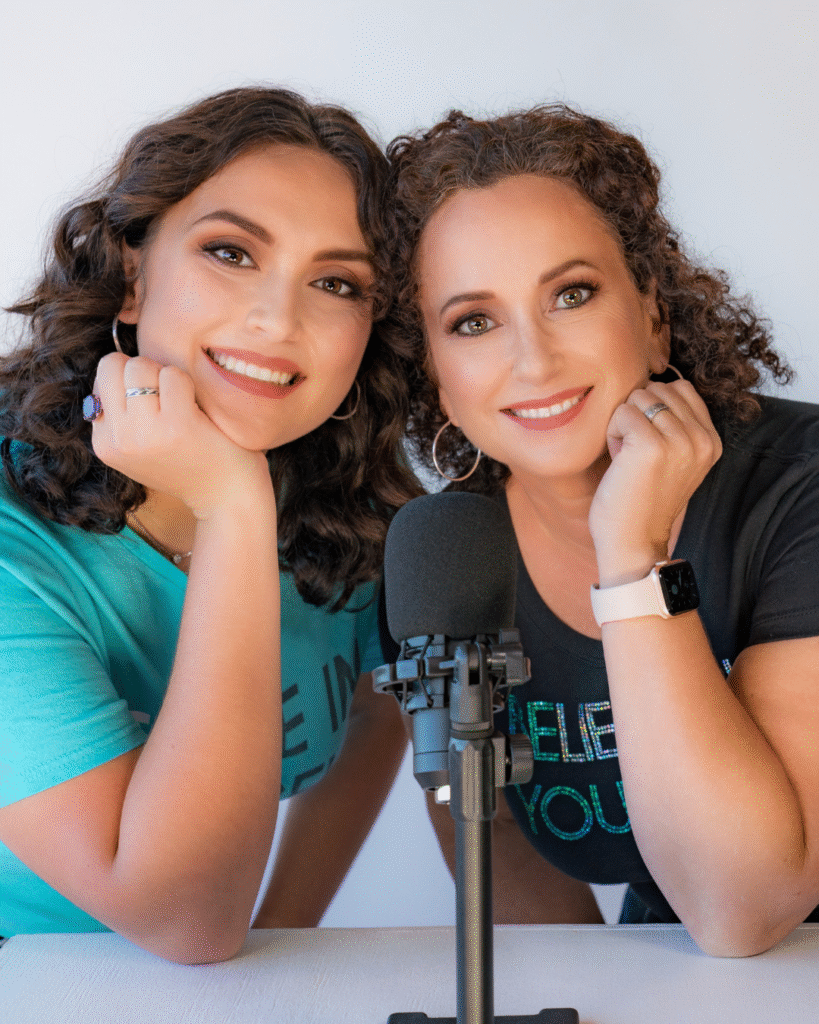 Simone and Olivia Knego with podcast microphone