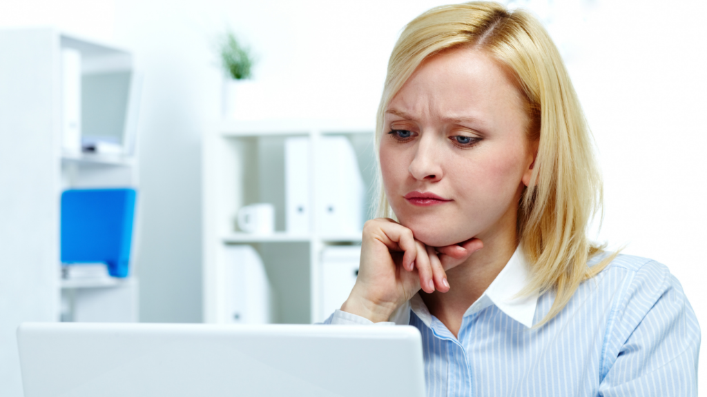Image of a woman in an office setting.