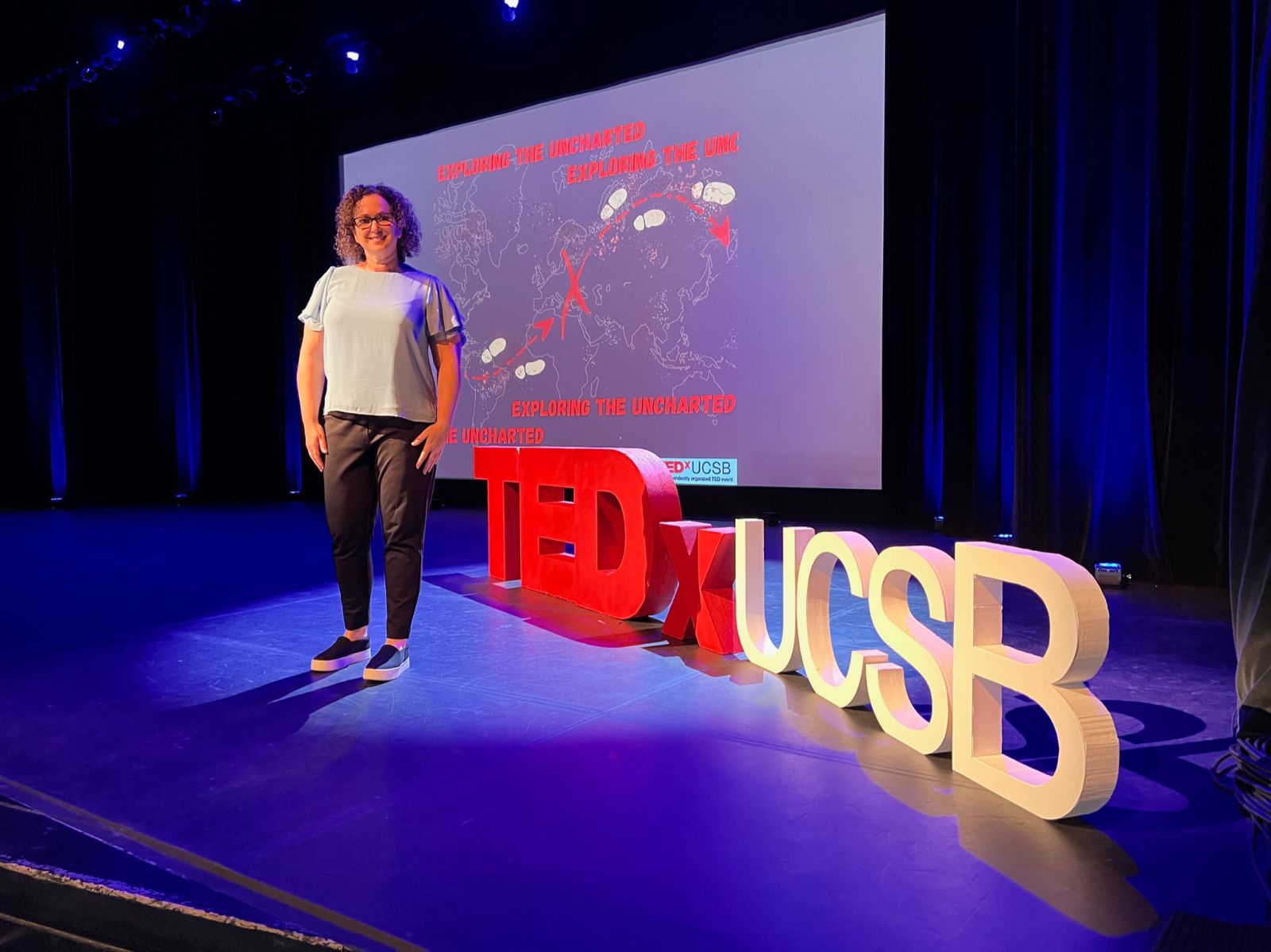 Simone Knego, keynote speaker on confidence in the age of AI, on the TEDx stage