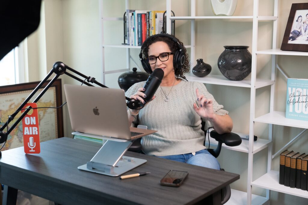 Simone Knego recording her podcast